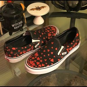 Size 7.5 slip on women’s Valentine heart print Vans. Like new & barely worn